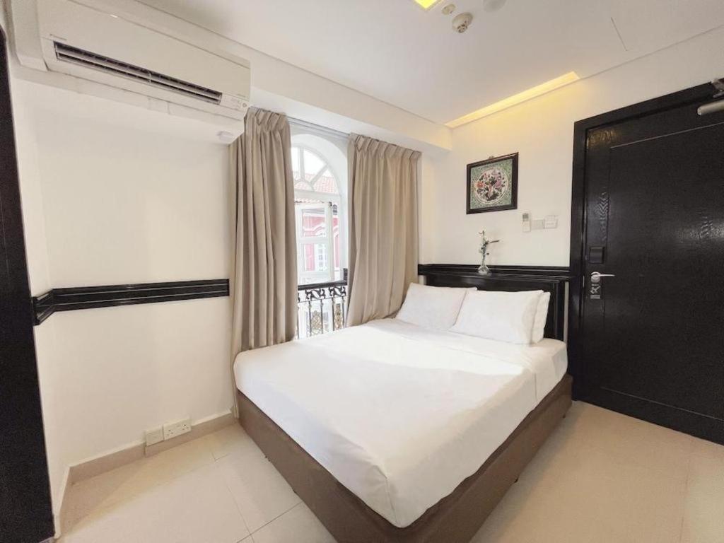 Reddoorz Near Marine Parade Singapura