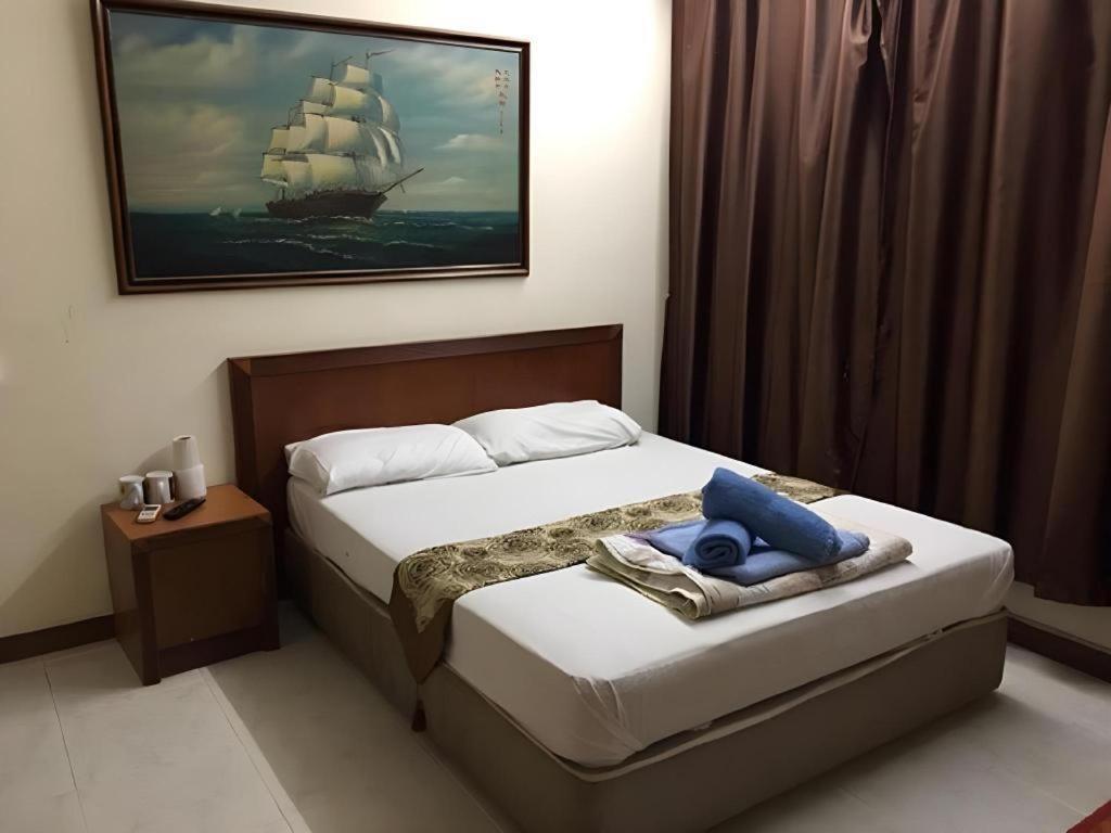 Lai Ming Cosmoland Hotel Singapura